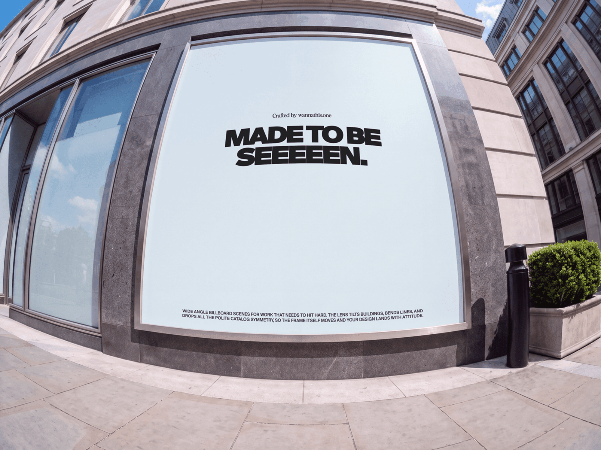 Curved billboard running along the top of a shopfront on a city street