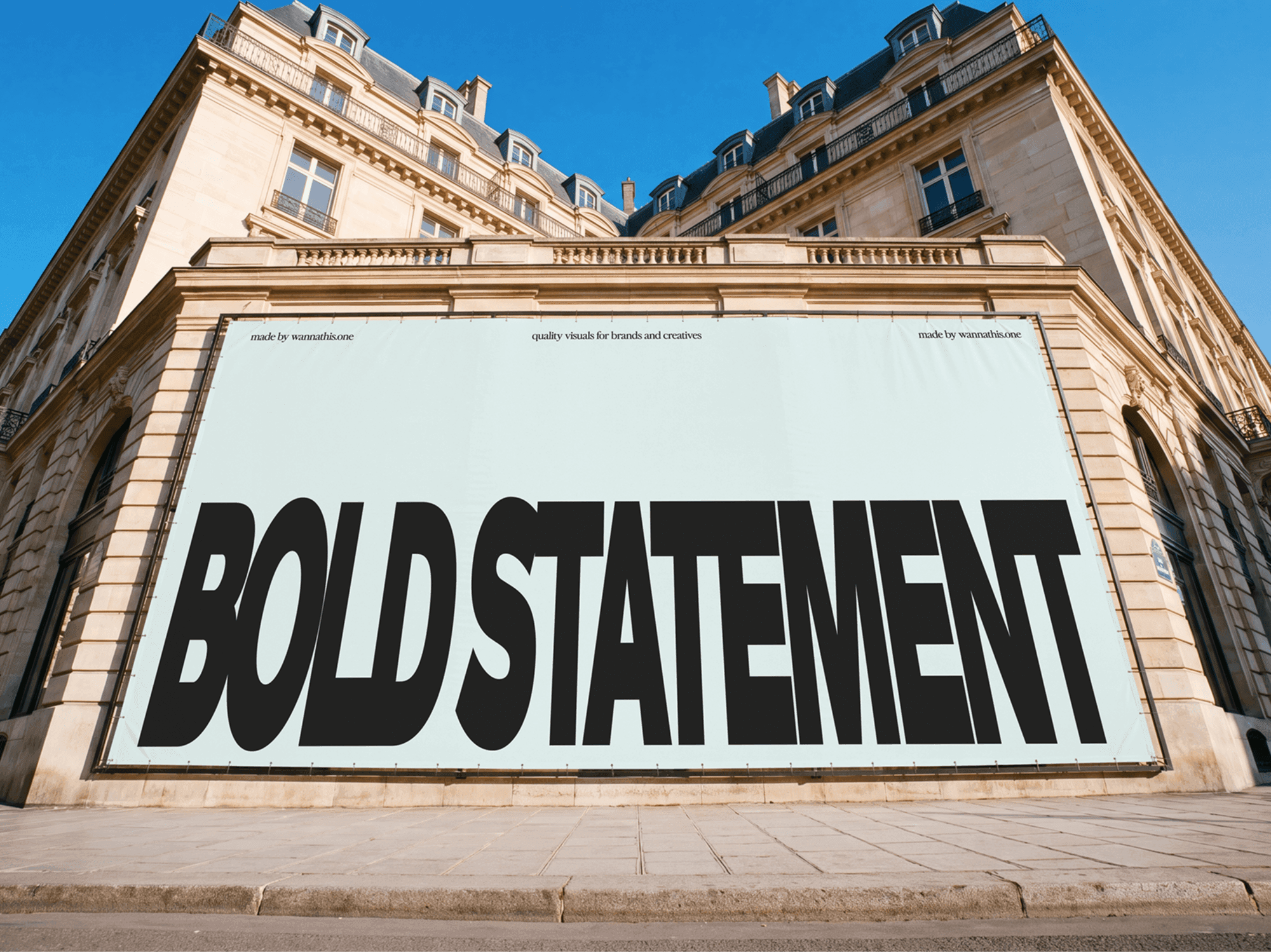 Wide horizontal billboard mounted flat across the wall of an older city building