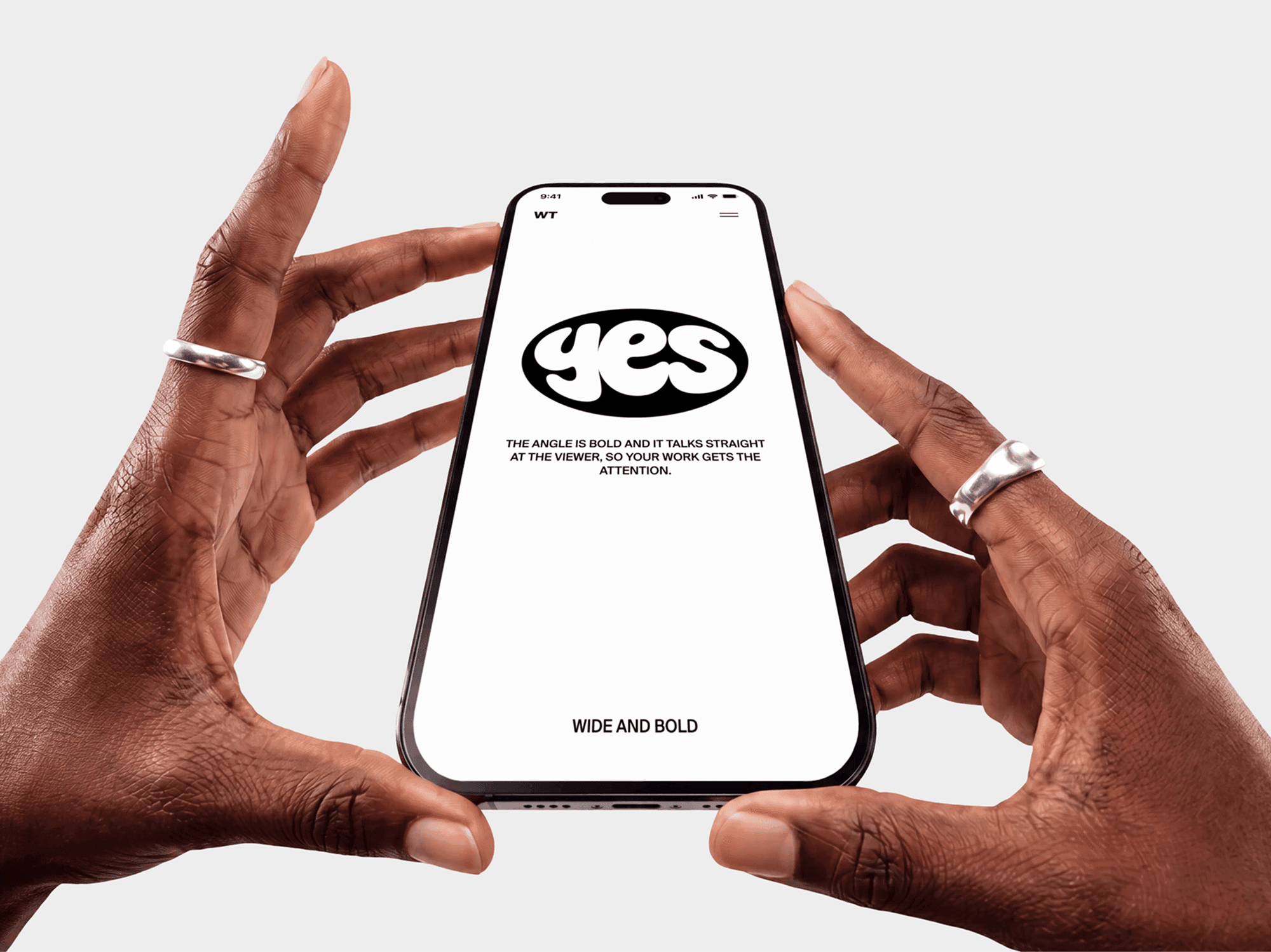Two hands holding an iPhone mockup square to the camera in a front view