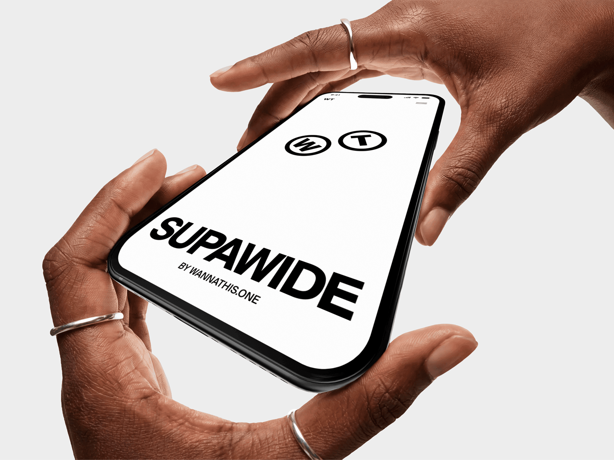 Two hands cradling a tilted iPhone mockup with fingers draped over the top edge