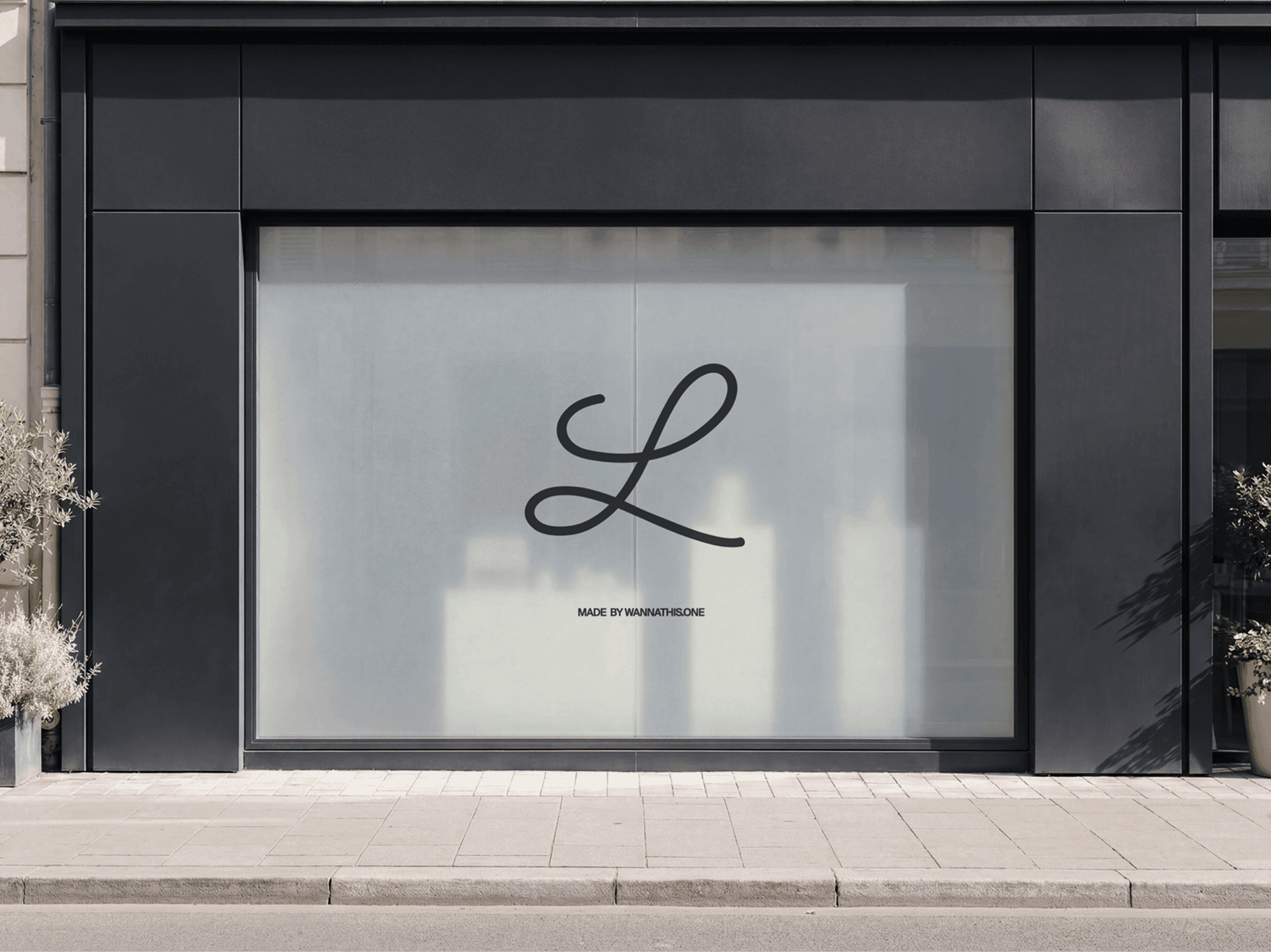 Wide shop window display mockup on a refined modern commercial building facade in a clean urban scene