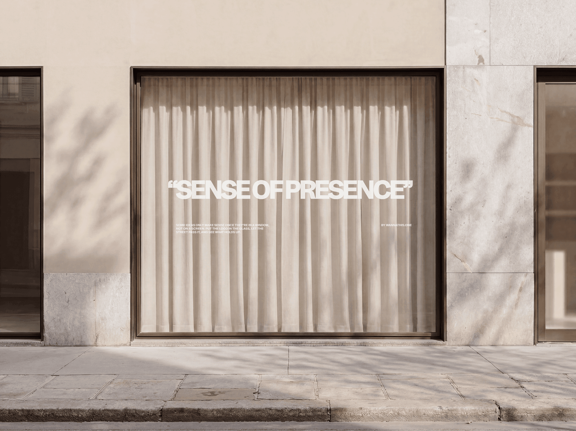 Classic storefront window signage mockup with intimate soft curtains behind the glass in a refined boutique scene
